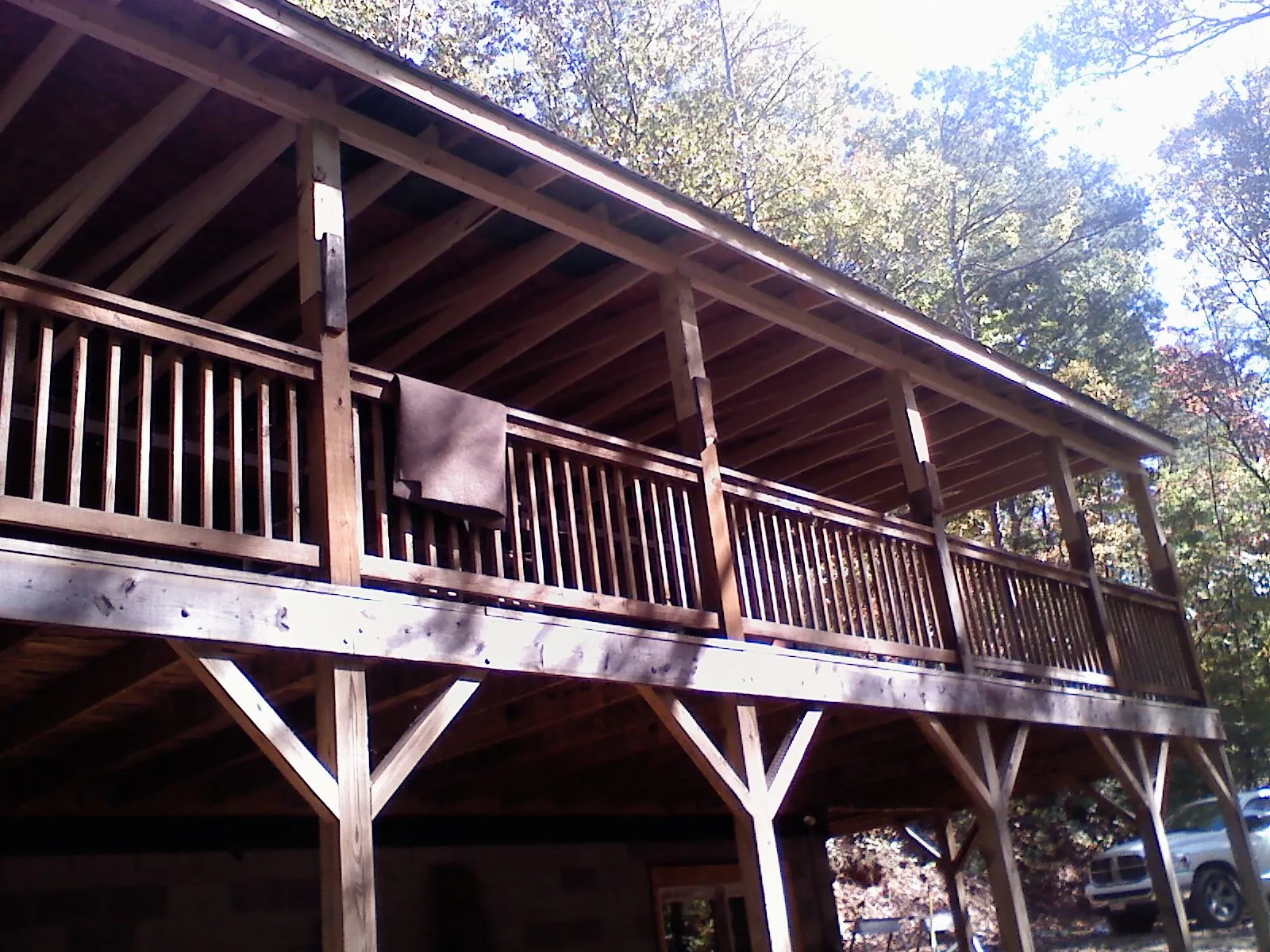 Timber framing under a new elevated porch and deck — Roof Leak Repair in Beatrice by Roofing Brothers